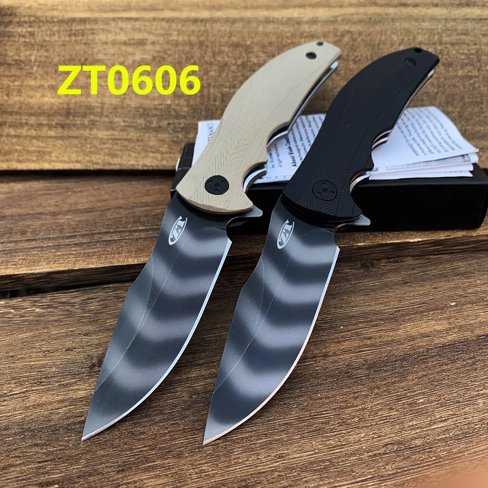 

Hot new ZT 0606 Ball bearing folding knife ZT 0606 9cr14mov Blade G10 handle EDC Camping knife 0606/ 0920 /0095