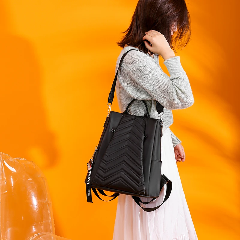 Новинка, антикражные рюкзаки из ткани Оксфорд с подвеской из мультфильма, женские дизайнерские школьные сумки для подростков, водонепроницаемые Модные рюкзаки для путешествий
