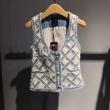 

New denim color contrast splicing cardigan vest Lingge nail bead sleeveless coat female trend