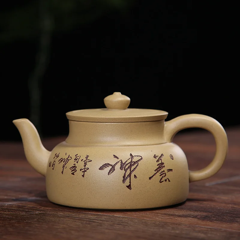 

Yixing Clay Teapot Segment Mud Charm Pot Handmade Lettering Large Size Yellow Tea Pot Wholesale Entirely Handmade Gift Manufactu