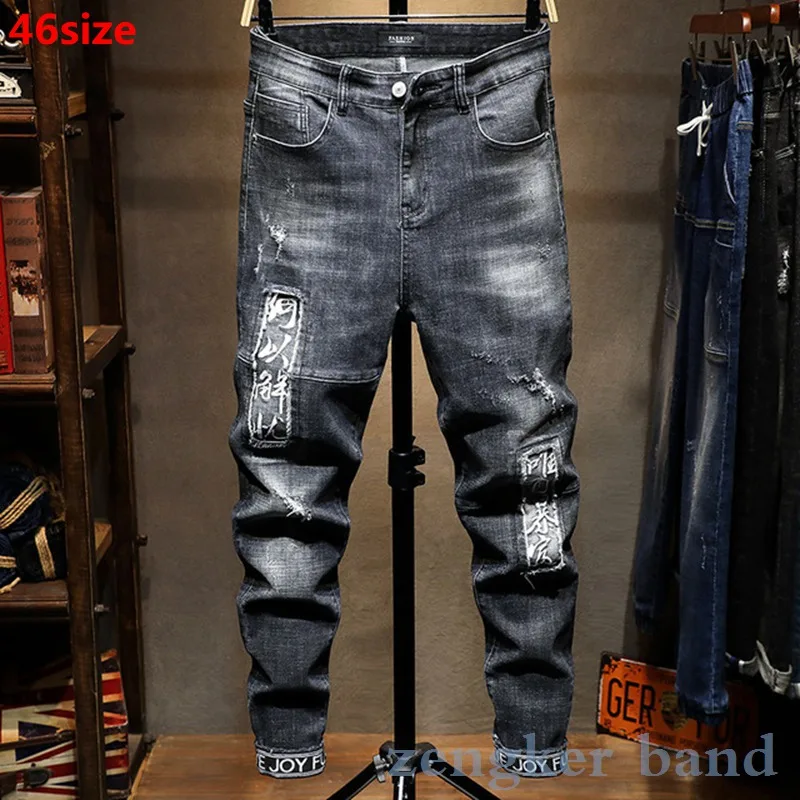 Spring men's pants trendy harem pants blue black jeans men's loose holes letters large size trousers ripped jeans for men Spring men's pants trendy harem pants blue black jeans men's loose holes letters large size trousers ripped jeans for men