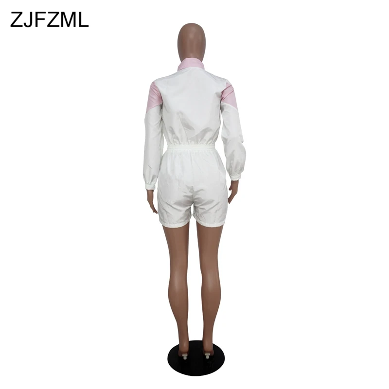 Женский комбинезон с длинным рукавом розовый/белый в полоску цельный на молнии