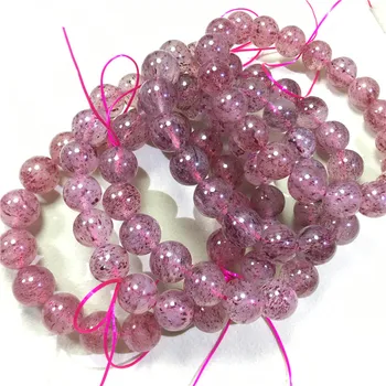 

Natural strawberry crystal bracelet peach blossom pink strawberry crystal bracelet