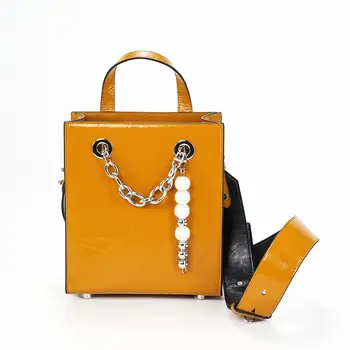 

Cowhide wide shoulder strap portable bucket bag pearl ornaments personalized shopping bag tote messenger shoulder female