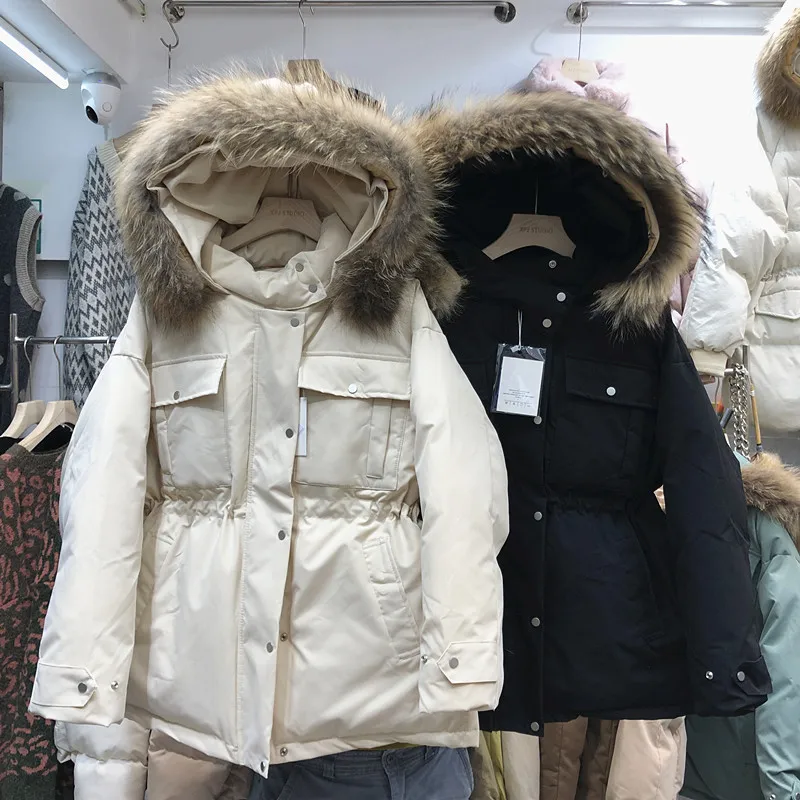 Универсальные студенческие пальто Новые Осенние Зимние приталенные куртки с капюшоном и воротником из меха енота женские стеганые куртки с длинным рукавом