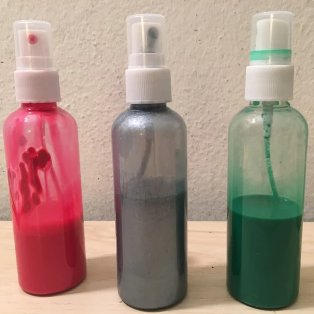 Refillable perfume container