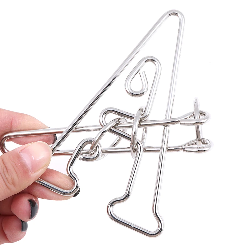 головоломки металлические сложные