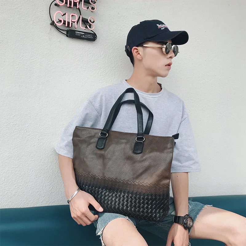

Q the new Korean version of embroidery retro men's handbags men's handbags fashion woven bag briefcase computer bag