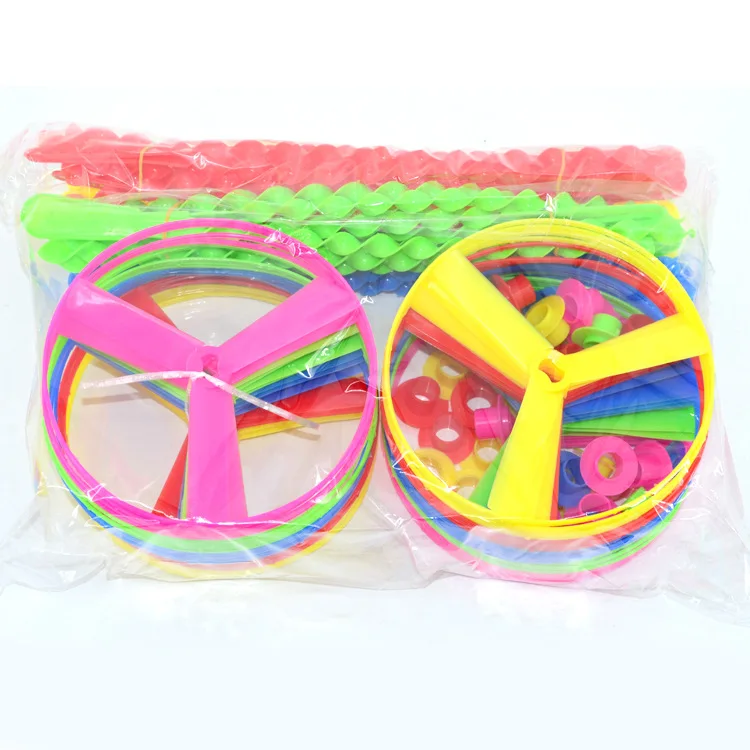 Горячая Летающая волшебная игрушка пластиковый ручной толчок UFO школьные детские игрушечные студенты мешок 40