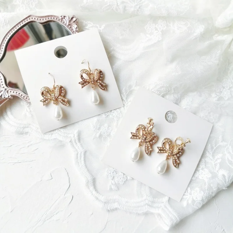 

Temperament Sweet Girl Lady Imitation Pearl Bow Dangle Earrings Korean Fashion Water Drop Ear Clip Jewelry Women's Accessories