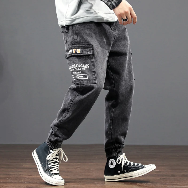 

Japanese Vintage Fashion Men Jeans Loose Fit Black Big Pocket Cargo Pants White Stripe Designer Hip Hop Jeans Men Joggers