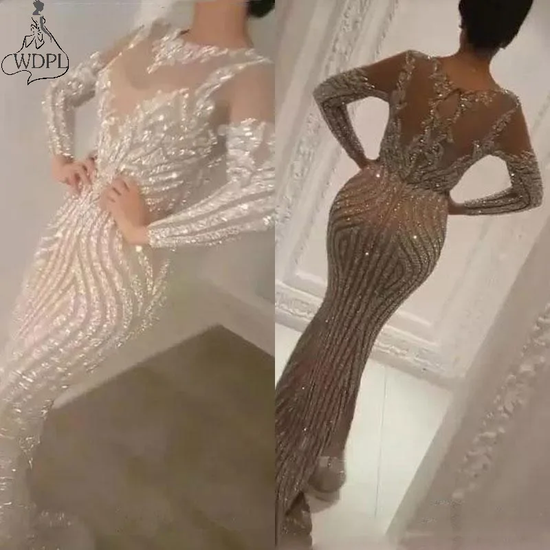 

2020 Luxury Long Sleeve Sequined Silver Mermaid Prom Dresses Sexy Sheer Jewel Neck Evening Dress Glitter Celebrity Prom Gowns