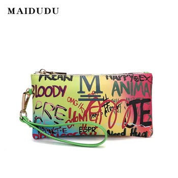 

New clutch bag for ladies. New graffiti print ladies wrist bagLetter coin purse. Casual fashion clutch