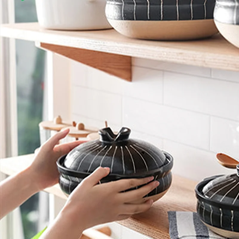 https://ae01.alicdn.com/kf/H717e1dd4b7654002a354973bcb45ae07y/Ceramic-Casserole-Japanese-Black-Round-0-5-3L-Multiple-Size-Cooking-Pot-Pan-Household-Kitchen-Supplies.jpg