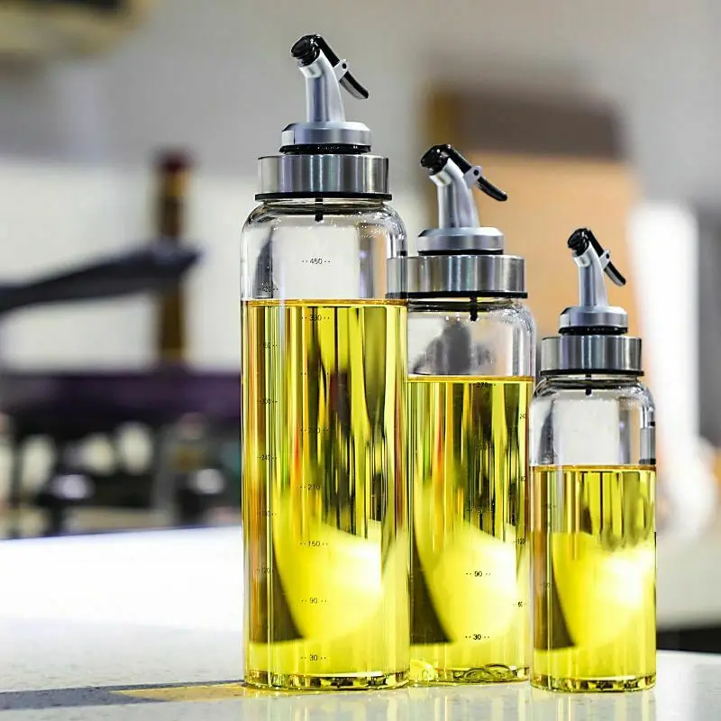 Botella de aceite de vidrio dispensador de aceite de oliva, dispensador de  medición de vinagre de ac…Ver más Botella de aceite de vidrio dispensador