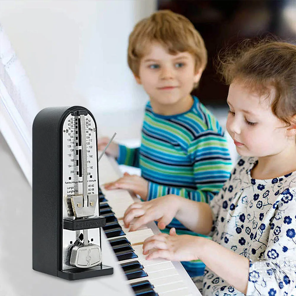 

Portable Guitar Metronome Universal Mechanical Metronome Piano Guitar Violin Metronome Musical Instrument Accessories