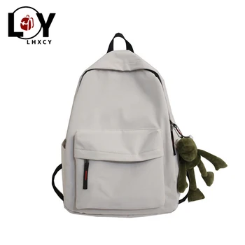 

Solid Color Frog Ornament Canvas School Backpack High Capacity Travel Backpack For School Teen Female High Quality Designer Bag