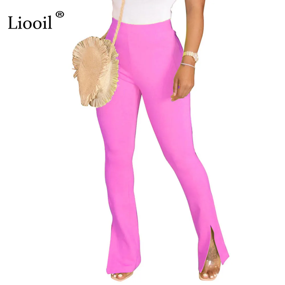 white tight flared trousers