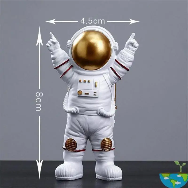 宇宙飛行士の置物です 月ロケットと宇宙飛行士の置物 金属製 作家もの - メルカリ