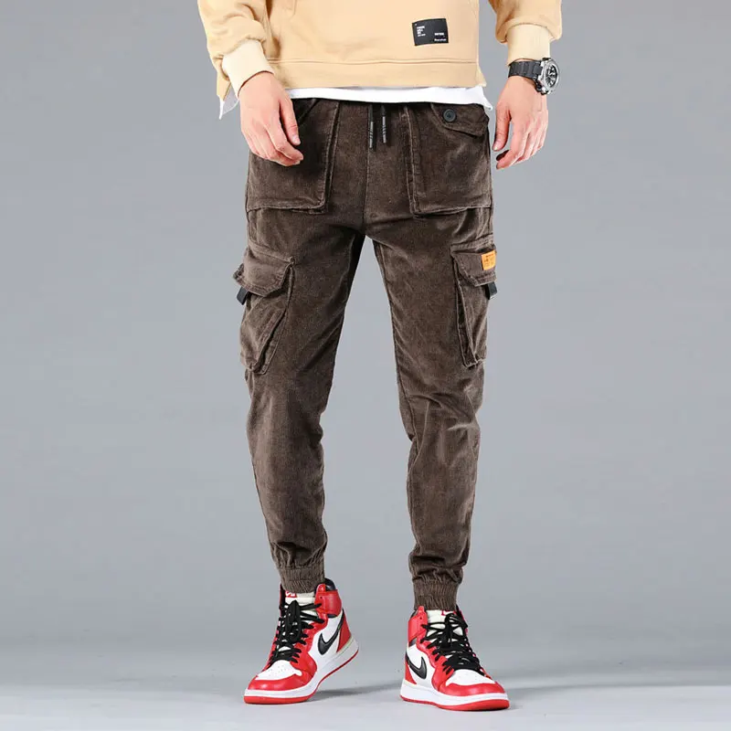 

Newly Designer Fashion Men Jeans Loose Fit Big Pocket Casual Corduroy Cargo Pants Streetwear Hip Hop Joggers Wide Leg Trousers
