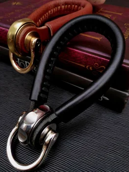 

Three-angle keychain leather rope men's car hanging buckle fingertip gyro simple cowhide hand-woven rope pendant chain