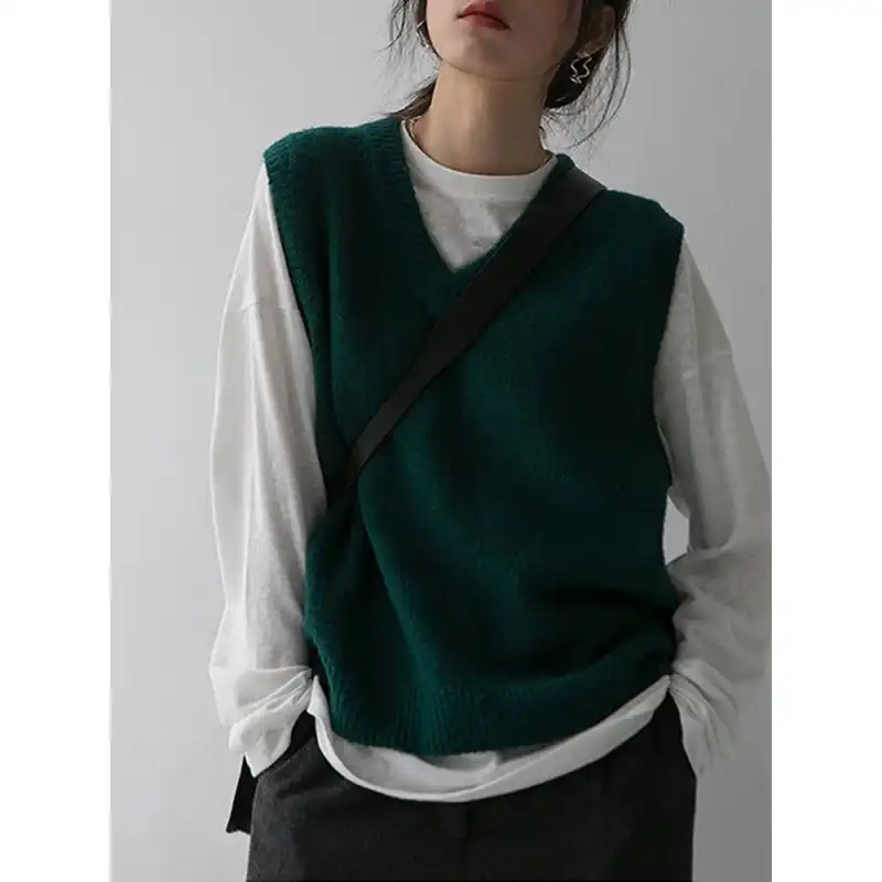 green knitted vest