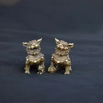 

Chinese antique brass pair of lion pendants copper desktop accessories