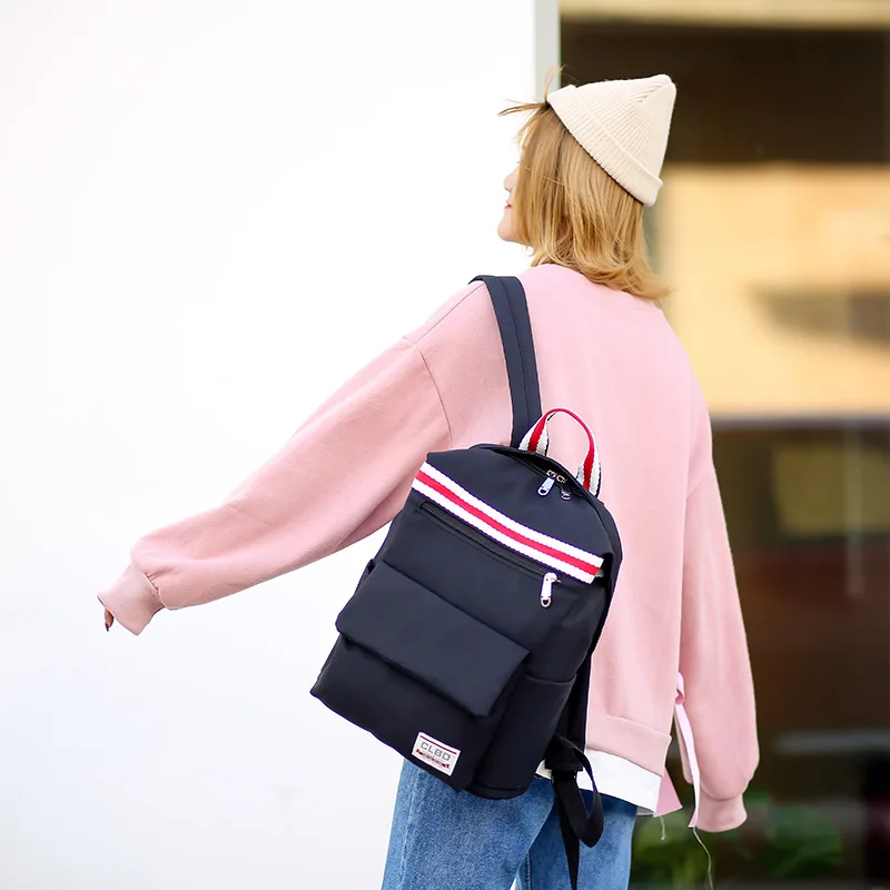 

New 2019 Oxford cloth backpack solid color leisure travel for men and women junior and senior high school students schoolbag