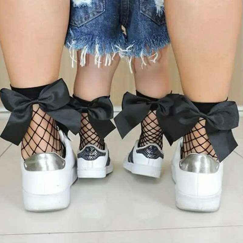 Новые модные сетчатые носки для девочек, стрейчевые, прозрачная в крупную сетку, сетчатые носки, удобные, с бантом