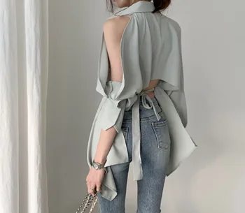

Korean spring new wild fashion temperament open waist solid color long sleeve shirt