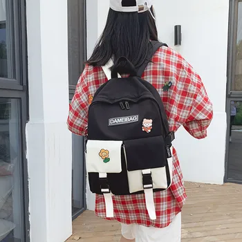 

New Korean version of nylon college student schoolbag middle school student schoolbag female fashion hit color medal backpack