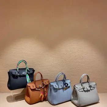 

New high quality leather fashion trend classic platinum bag top layer leather hand bag for women