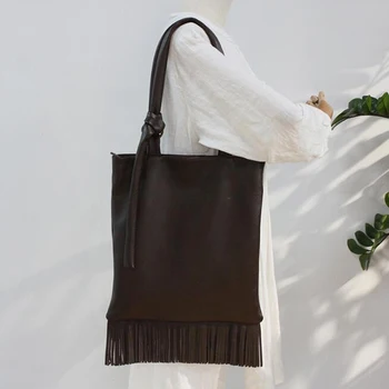 

Women Shoulder Bag Solid Genuine Leather Tassels Trending Bandage Strap Bag Cowhide Big Tassel Fringe Messenger Shoulder Handbag