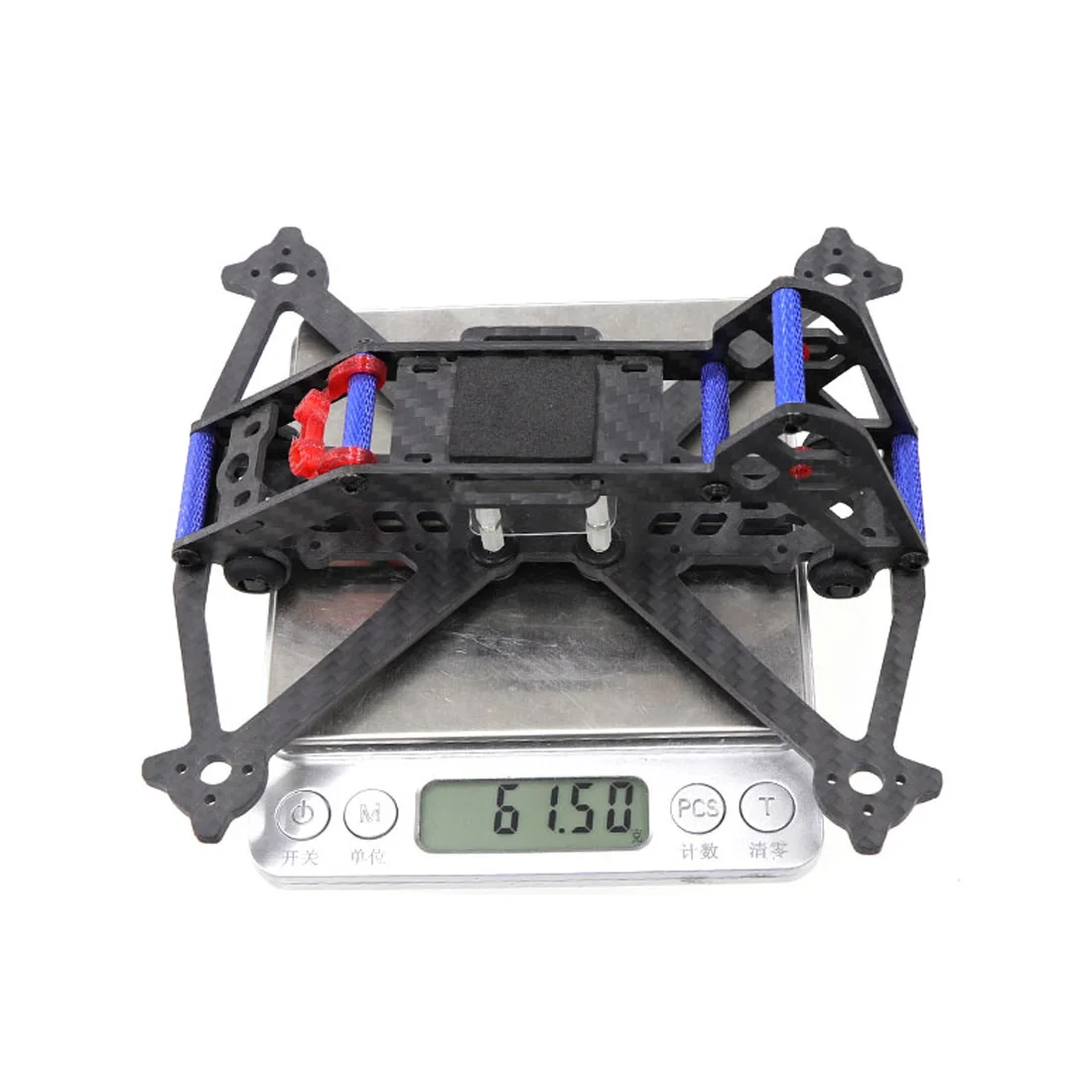 Assemblage du kit châssis quadricoptère JMT Mini Acrobrat 163, illustrant la structure légère en fibre de carbone.