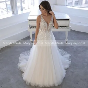 

Illusion Bodice Boho Wedding Dresses Deep V Neck Poland Bride Wedding Gowns Backless Suknia ślubna White Tulle Bridal Gowns