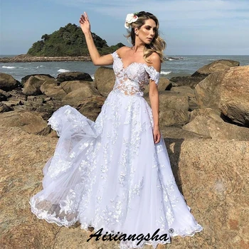 

Sexy Illusion Tulle Ball Gown Wedding Dresses Sweetheart Sleeveless Backless Applique Floor-Length Elegant Wedding Bridal Gowns