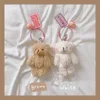 1pcsCute Cartoon peluche ours lapin porte-clés pompon bibelot pour bébé en peluche jouet fille sac voiture porte-clés téléphone Mobile pendentif bijoux ► Photo 1/6