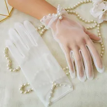 Rękawiczki damskie rękawiczki ślubne ślubne z perłami rękawiczki dziewczęce rękawiczki balowe białe rękawiczki ślubne akcesoria ślubne tanie tanio CN (pochodzenie) POLIESTER Palec Jeden rozmiar DO NADGARSTKA WOMEN Adult Gładkie barwione WST11 Women Girl Short Gloves