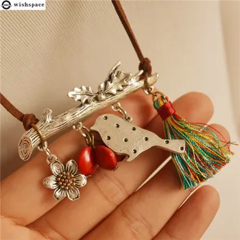 

The new high creative fashion female bird flower tassel pendant long necklace sweater chain accessories wholesale