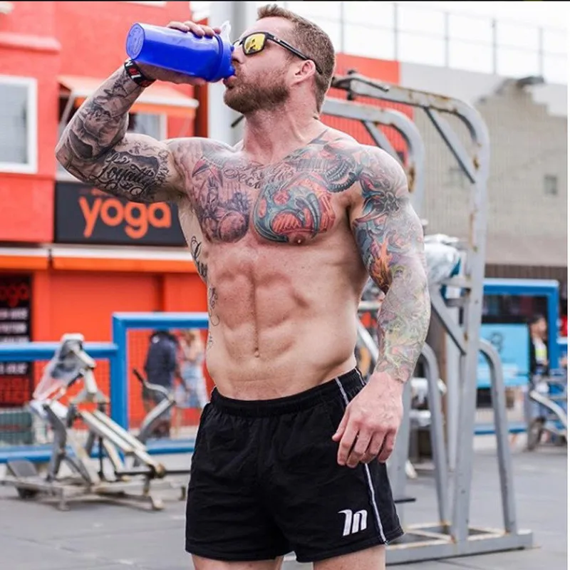 Новые летние повседневные шорты для фитнеса, мужские спортивные шорты для бодибилдинга, короткие спортивные штаны для бега, дышащие брюки, пляжные шорты для мужчин