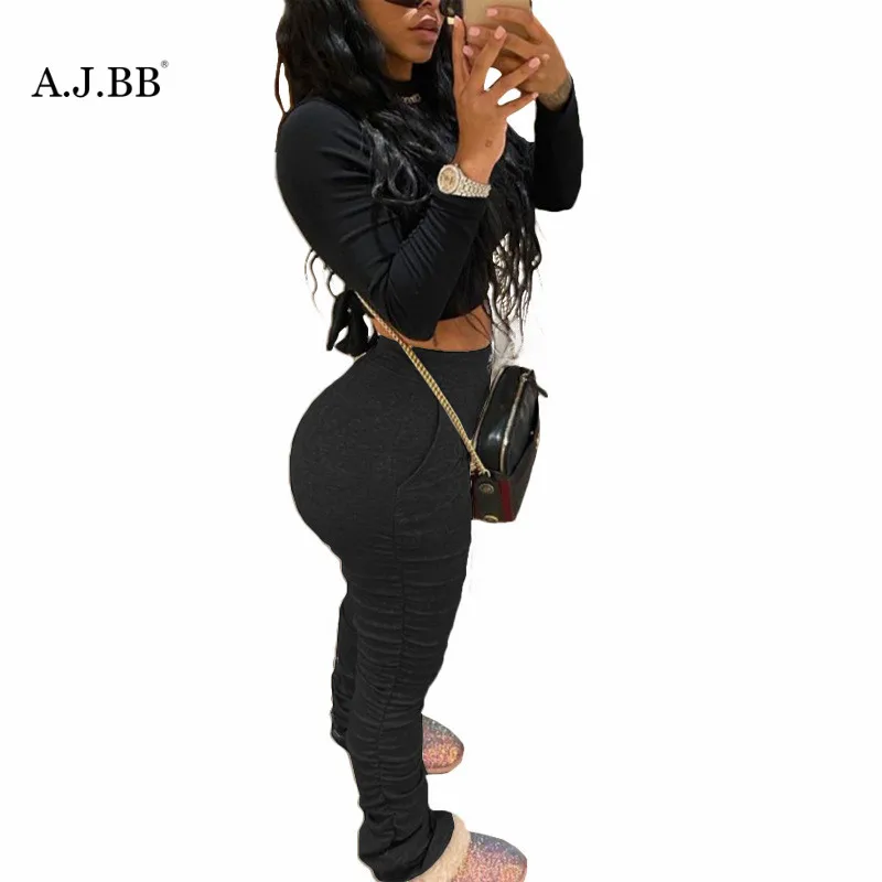 

2020 European summer and autumn new leisure solid color women's pants fashion slim elastic belt mid waist slim Leggings