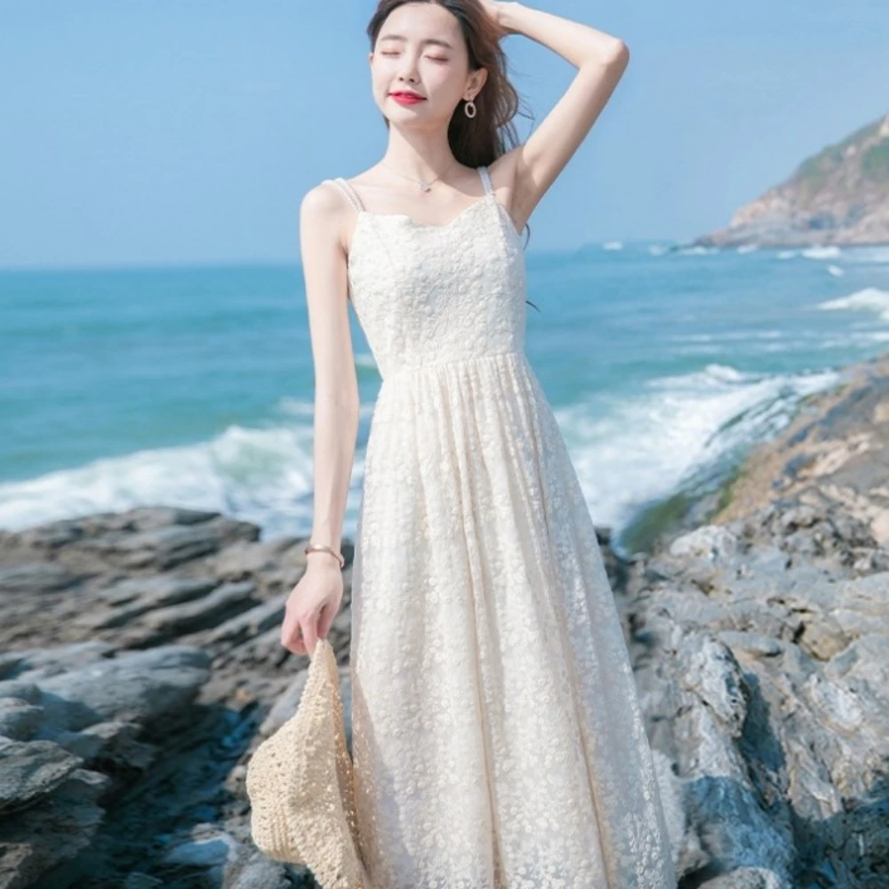 

2021 fashion cut out embroidery lace dress new summer Bohemian women's long skirt white lace long spaghetti belt top beach skirt