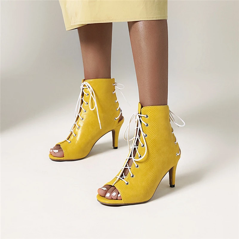yellow snakeskin ankle boots