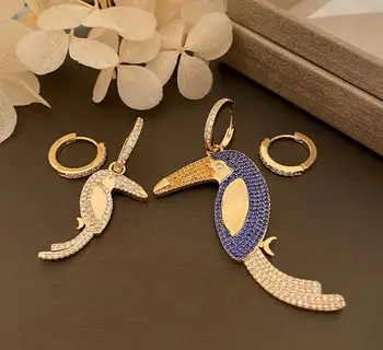 

Asymmetric shell toucan color rhinestone ladies chic woodpecker earring