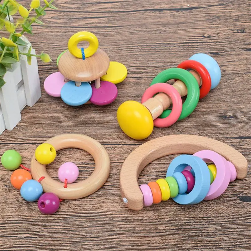 

4Pcs Montessori Wooden Rattles Hold Rattle Hand Bell Gift Baby Toys Toddler Infant Toy F3ME