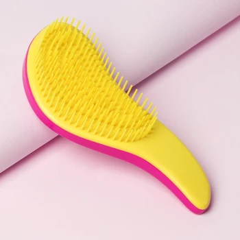 

Massage comb, color pink / yellow