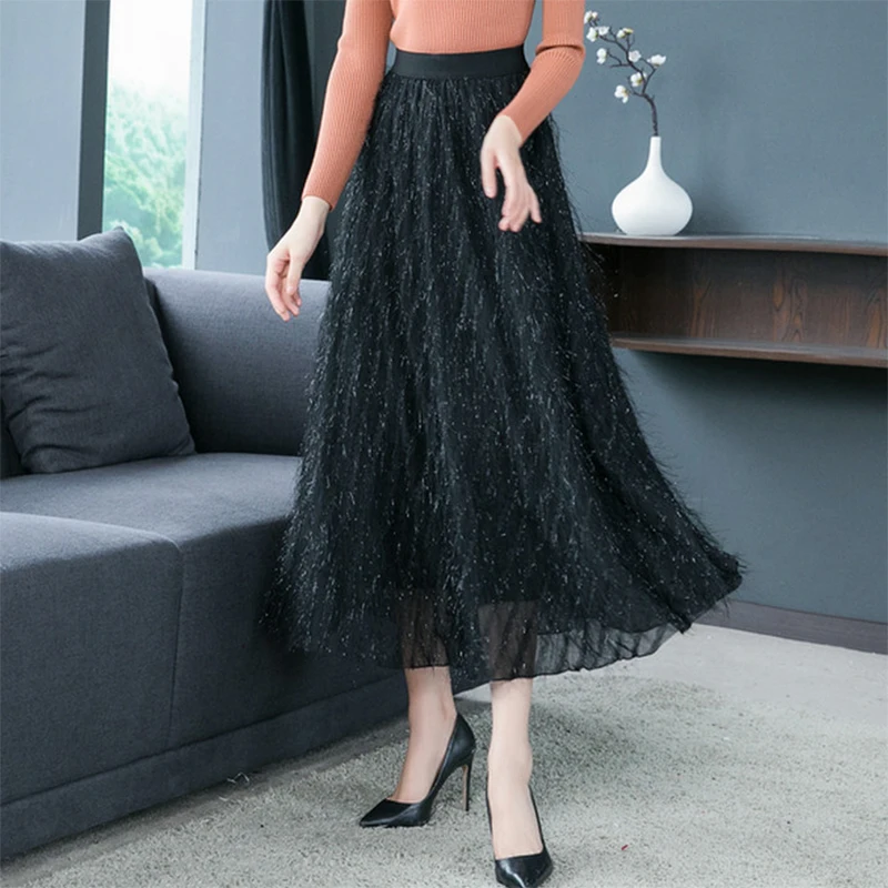 

Women skirts New winter Tassel Hip wrap black hem A-line Mid-Calf skirts