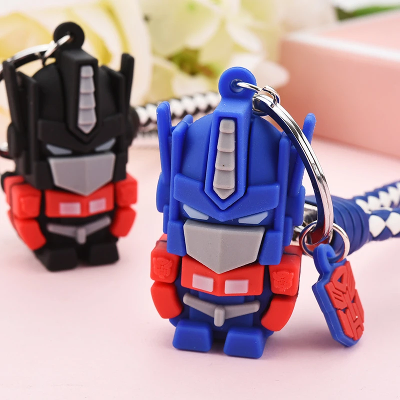 アニメ映画トランスフォーマー軟質合金キーホルダーオプティマスプライムロボット人形男性と女性のカップルジュエリーペンダント車のキーチェーン Key Chains Aliexpress