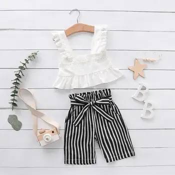 

Girls' suit spring and autumn models 2020 new Korean explosions solid color sling top + striped bow trousers two-piece suit