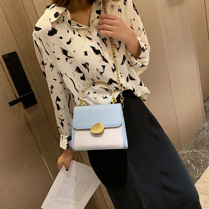 

2019 New flax stereo shaped small square bag blade lock clasp single shoulder slant slant Sling women's bag